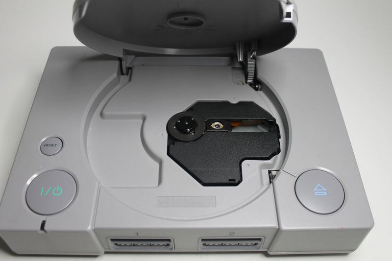Laden Sie das Bild in Galerie -Viewer, Sony PlayStation 1 Spielekonsole - Grau (SCPH-7502) teildefekt
